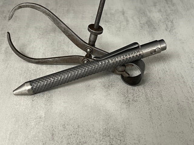 TiButton® Titanium Double Lock