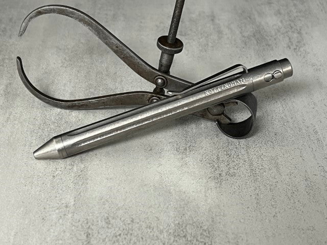 TiButton® Titanium Double Lock