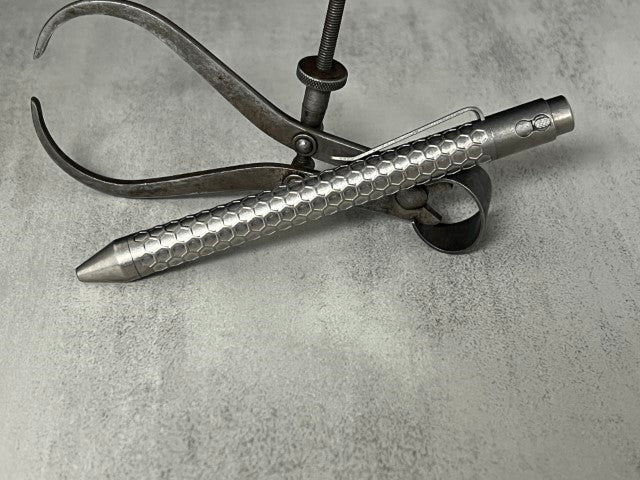 TiButton® Titanium Double Lock