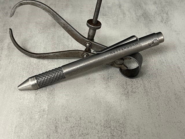 TiButton® Titanium Double Lock