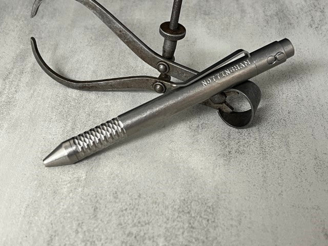 TiButton® Titanium Double Lock