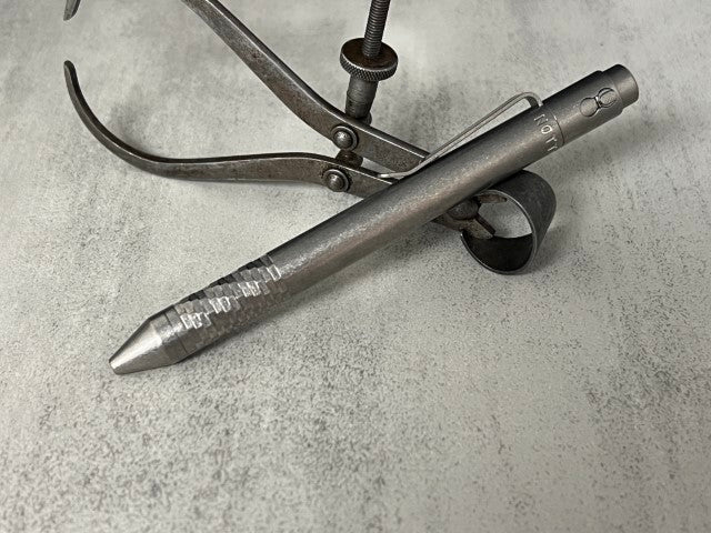 TiButton® Titanium Double Lock