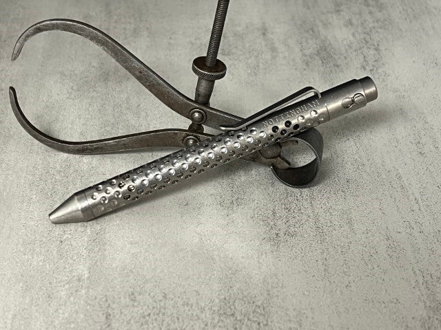 TiButton® Titanium Double Lock