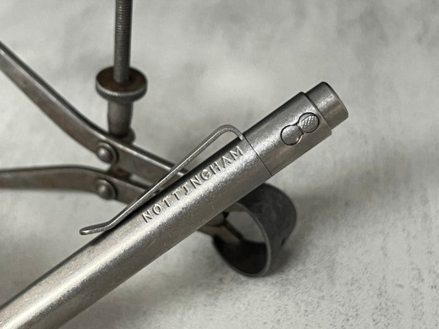 TiButton® Titanium Double Lock