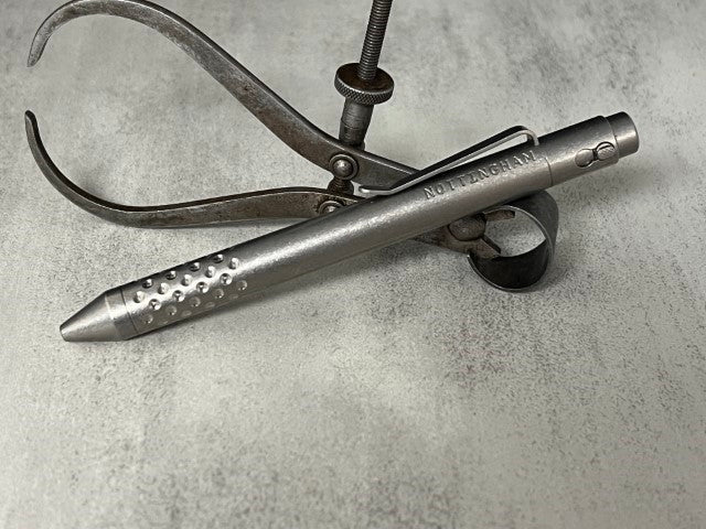 TiButton® Titanium Double Lock