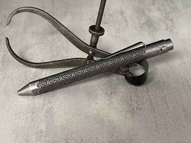 TiButton® Titanium Double Lock