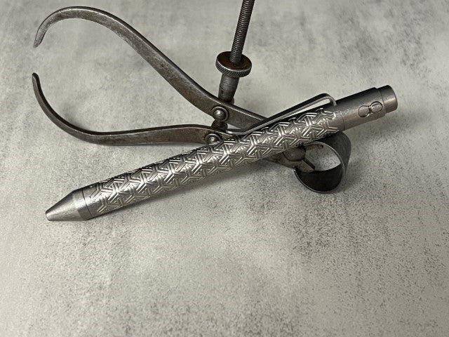 TiButton® Titanium Double Lock