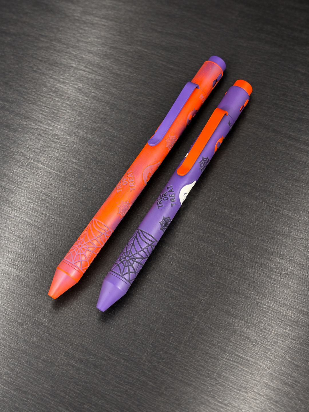 2026 Trick or Treat Limited Edition Pens in Four Color Cerakote and Purple & Orange Distressed Cerakote | Nottingham Tactical
